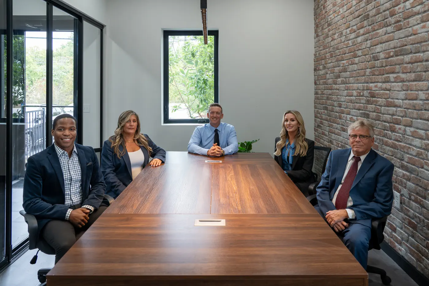 Cohen Mortgage loan officers and staff at the conference table in the Cincinnati office